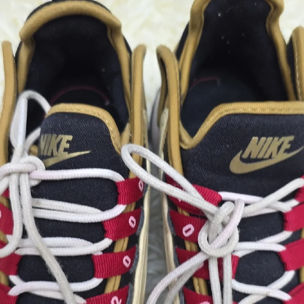 Nike Black and Gold Athletic Shoes